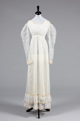 Lot 98 - A needle-run lace over-dress, circa 1820-25,...
