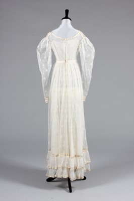 Lot 98 - A needle-run lace over-dress, circa 1820-25,...