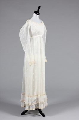 Lot 98 - A needle-run lace over-dress, circa 1820-25,...