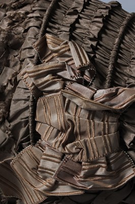 Lot 100 - A brown taffeta bonnet, circa 1850, with...