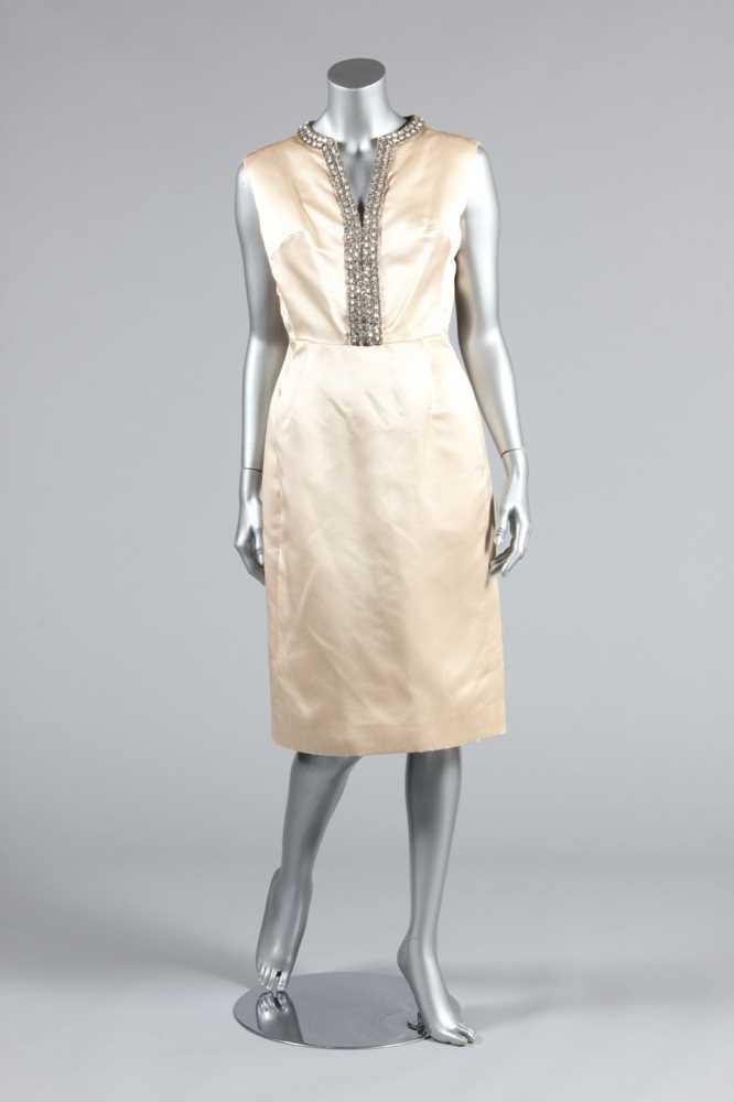 Lot 107 - A Christian Dior London ivory satin cocktail...