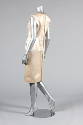 Lot 107 - A Christian Dior London ivory satin cocktail...