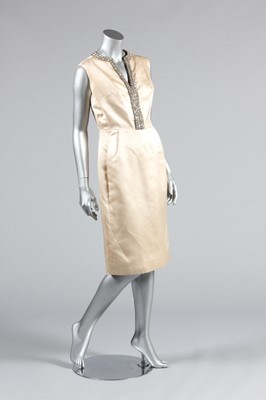 Lot 107 - A Christian Dior London ivory satin cocktail...