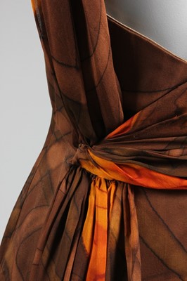 Lot 111 - A Pierre Cardin printed jersey maxi dress,...