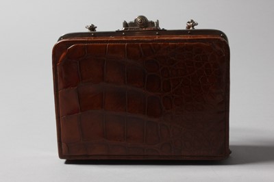 Lot 112 - An early handbag, French, circa 1910, of tan...