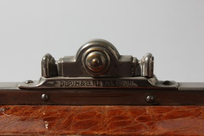 Lot 112 - An early handbag, French, circa 1910, of tan...