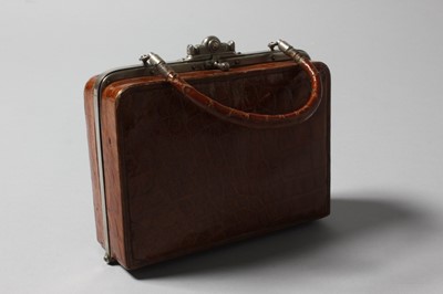 Lot 112 - An early handbag, French, circa 1910, of tan...