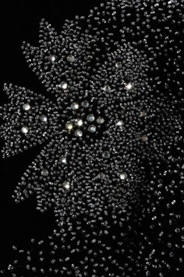 Lot 117 - A Debenham & Freebody beaded black velvet...