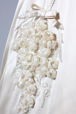 Lot 120 - A Maison Worth couture ivory satin bridal gown,...