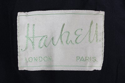 Lot 122 - A Norman Hartnell 'New-Look' suit, late 1940s,...