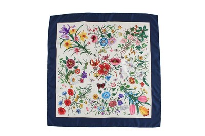 Lot 258 - Four Gucci printed silk scarves, 1980s-90s,...