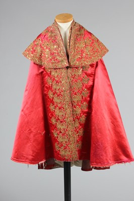 Lot 124 - A good embroidered rose satin matador cape,...