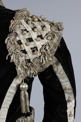 Lot 124 - A good embroidered rose satin matador cape,...