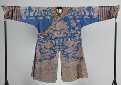 Lot 255 - A brocaded silk dragon robe, chi-fu, Chinese,...