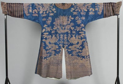 Lot 255 - A brocaded silk dragon robe, chi-fu, Chinese,...