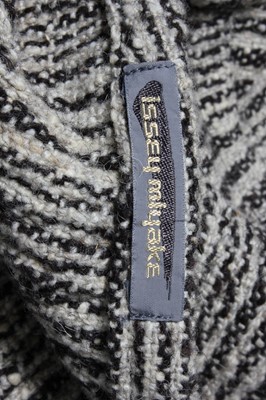 Lot 234 - An Issey Miyake black and white tweed tunic...