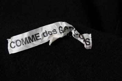 Lot 233 - A Commes des Garcons distressed-look black...