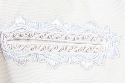 Lot 231 - A Lancetti couture ivory ottoman wool cocktail...