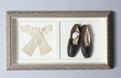 Lot 129 - A pair of brown leather infant shoes and...