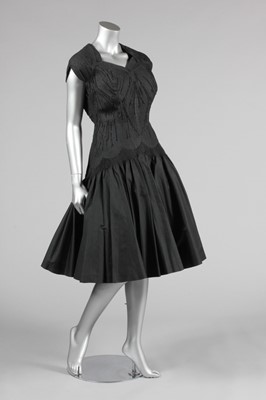 Lot 135 - A Carven couture black silk dinner dress, late...