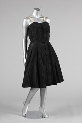 Lot 135 - A Carven couture black silk dinner dress, late...