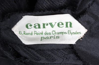 Lot 135 - A Carven couture black silk dinner dress, late...