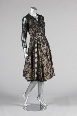 Lot 136 - A Nina Ricci couture black Chantilly lace...