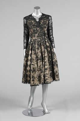 Lot 136 - A Nina Ricci couture black Chantilly lace...