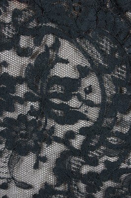 Lot 136 - A Nina Ricci couture black Chantilly lace...