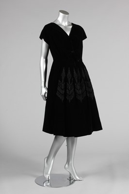 Lot 138 - A Nina Ricci couture black velvet cocktail...