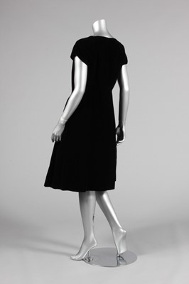Lot 138 - A Nina Ricci couture black velvet cocktail...
