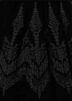 Lot 138 - A Nina Ricci couture black velvet cocktail...