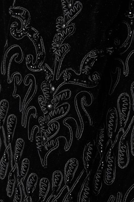 Lot 138 - A Nina Ricci couture black velvet cocktail...