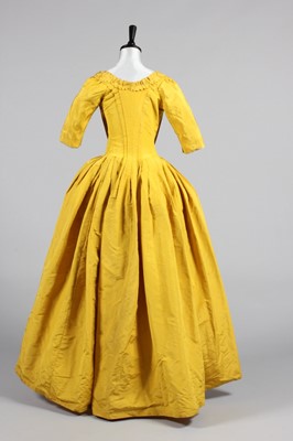 Lot 141 - A Chinese-yellow silk open-robe, circa 1770,...