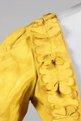 Lot 141 - A Chinese-yellow silk open-robe, circa 1770,...