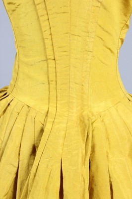 Lot 141 - A Chinese-yellow silk open-robe, circa 1770,...