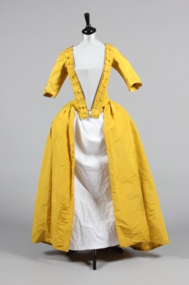 Lot 141 - A Chinese-yellow silk open-robe, circa 1770,...