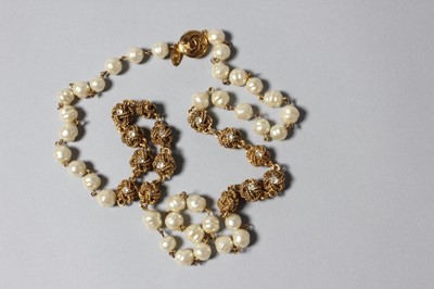Lot 154 - A Chanel sautoir, 1986-7, with gilt Chanel tag,...