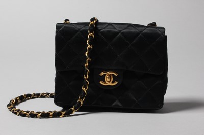 Lot 155 - A Chanel quilted satin shoulder bag, 1986-7,...