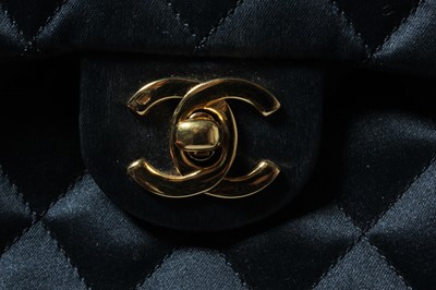 Lot 155 - A Chanel quilted satin shoulder bag, 1986-7,...