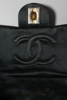 Lot 155 - A Chanel quilted satin shoulder bag, 1986-7,...