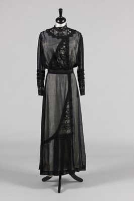Lot 170 - A printed chiffon garden party gown, circa...