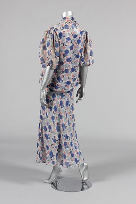 Lot 170 - A printed chiffon garden party gown, circa...