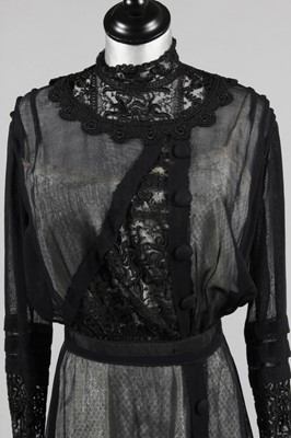 Lot 170 - A printed chiffon garden party gown, circa...