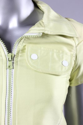 Lot 171 - A Courreges chartreuse satinised cotton jacket...