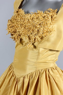Lot 176 - A group of cocktail/evening wear, late 1950s...