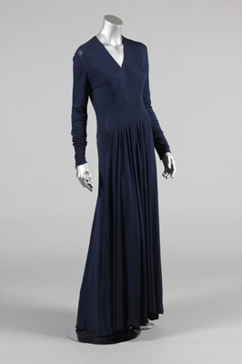 Lot 163 - A Carven couture navy silk jersey evening gown,...