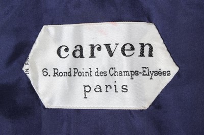 Lot 163 - A Carven couture navy silk jersey evening gown,...