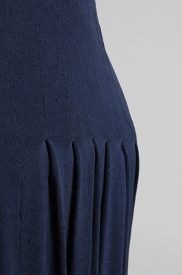 Lot 163 - A Carven couture navy silk jersey evening gown,...