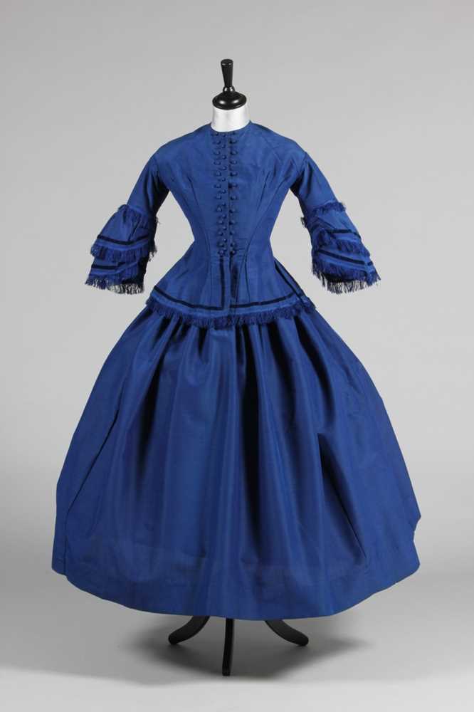 Lot 164 - A sapphire blue challis day dress, mid 1850s,...